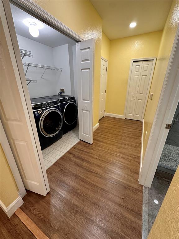 3280 Soho Street, Unit 308 Orlando, FL 32835 - Photo 34 of 45 a view of walk in closet with clothes and shoes
