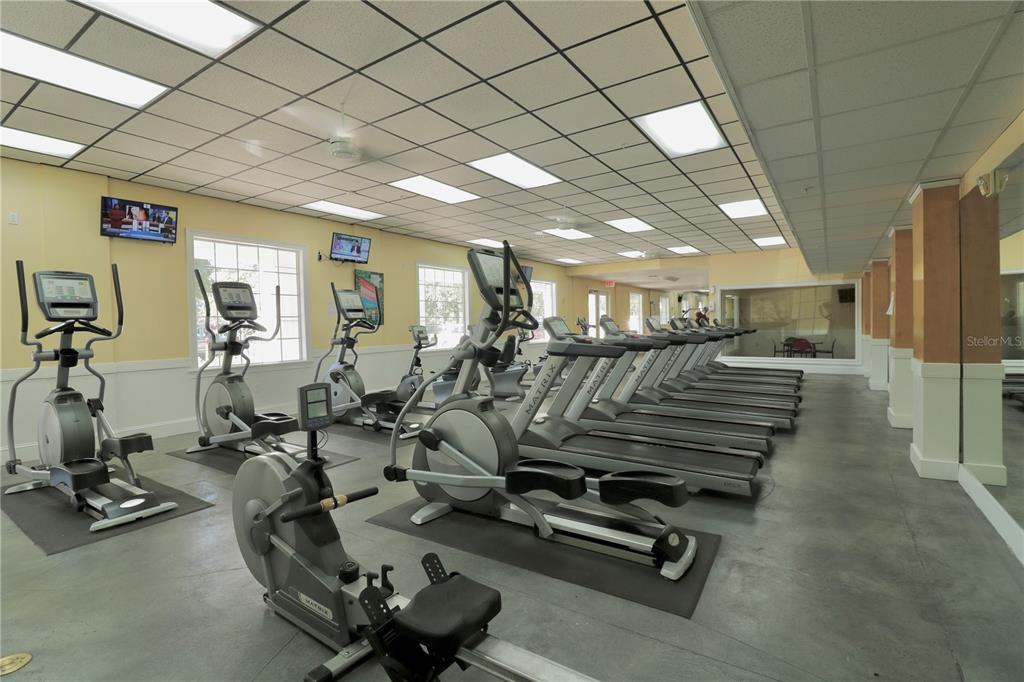 3280 Soho Street, Unit 308 Orlando, FL 32835 - Photo 39 of 45 a view of a room with gym equipment