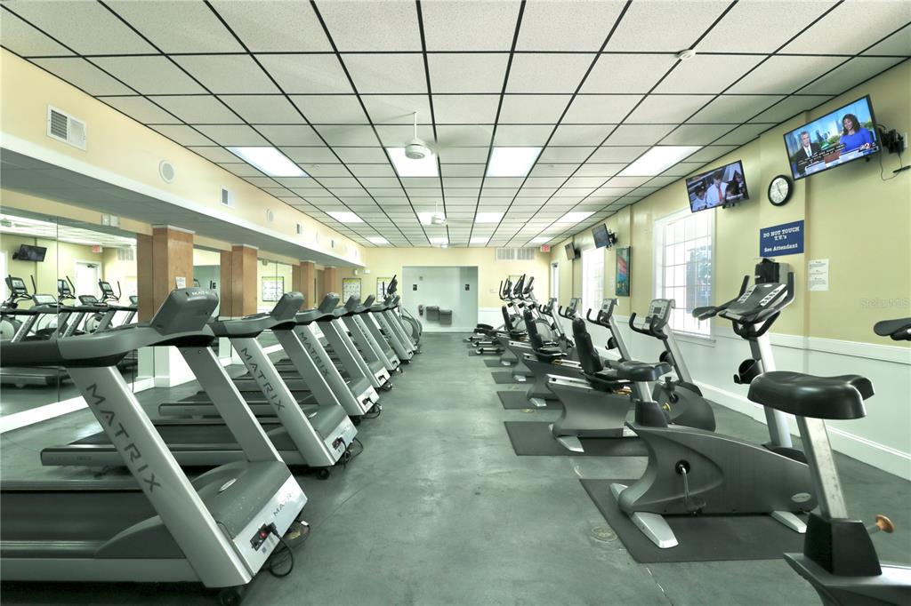 3280 Soho Street, Unit 308 Orlando, FL 32835 - Photo 40 of 45 a view of a room with gym equipment