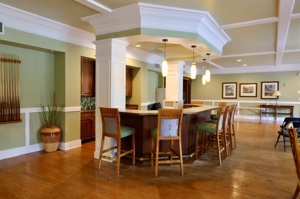 3280 Soho Street, Unit 308 Orlando, FL 32835 - Photo 45 of 45 a view of a dining room with furniture