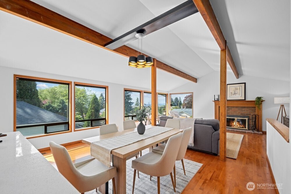 902 7th Avenue South Edmonds, WA 98020 - Photo 8 of 31 a view of a dining room with furniture window and wooden floor