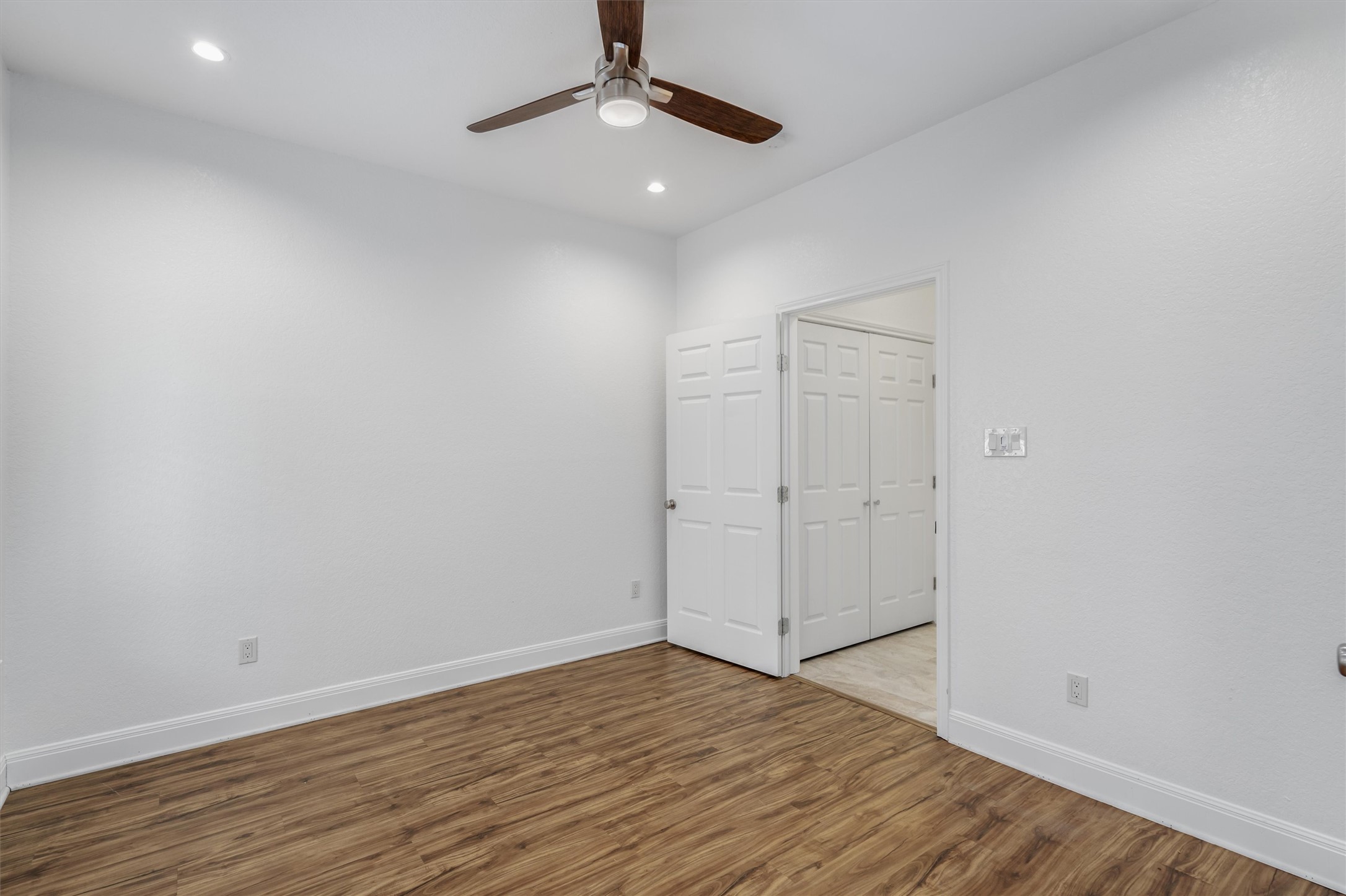 201 East 35th Street, Unit B Austin, TX 78705 - Photo 11 of 27 wooden floor in an empty room