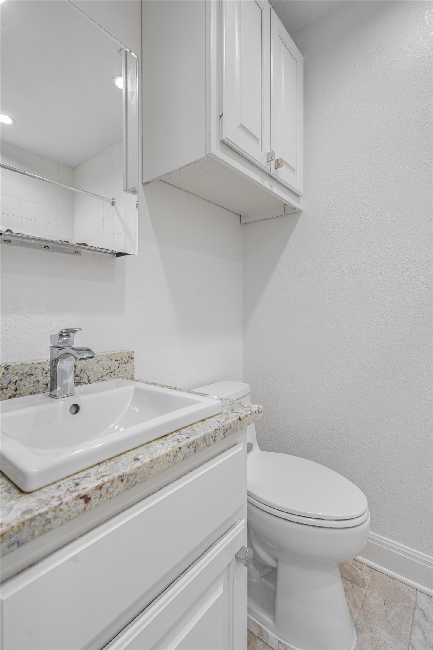 201 East 35th Street, Unit B Austin, TX 78705 - Photo 13 of 27 a bathroom with a sink a toilet and vanity