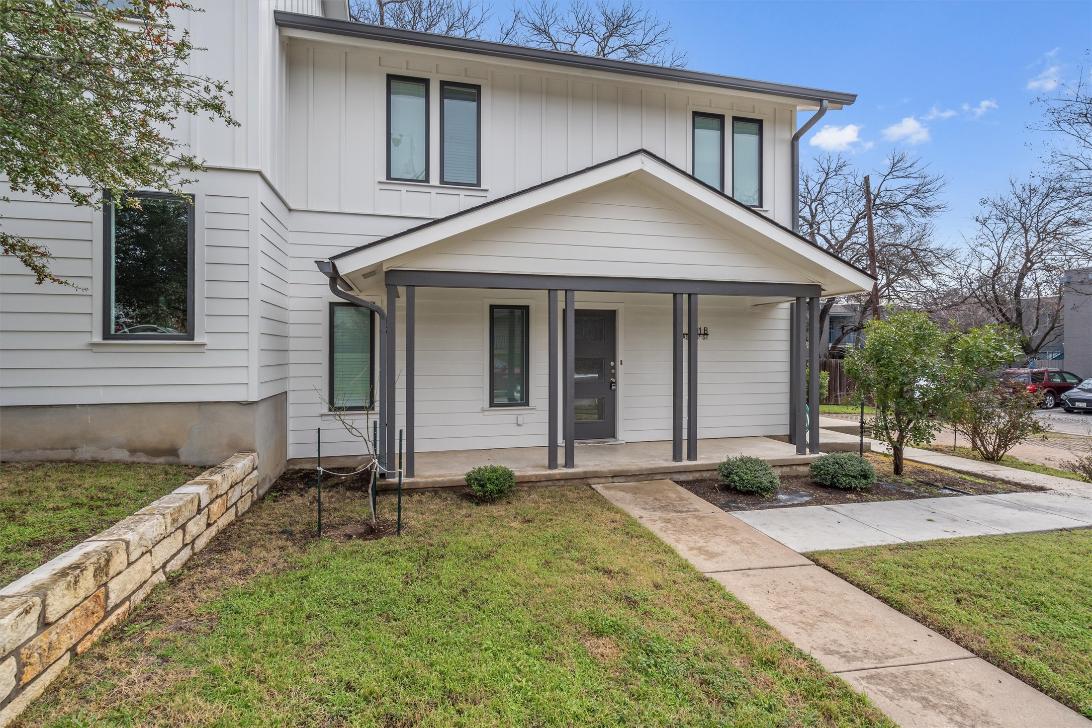 201 East 35th Street, Unit B Austin, TX 78705 - Photo 2 of 27 a front view of a house with garden