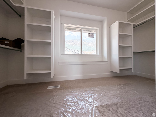 619 East Mountain Road North Ogden, UT 84414 - Photo 8 of 8 Built-in shelving units flank a window with mountain scenery