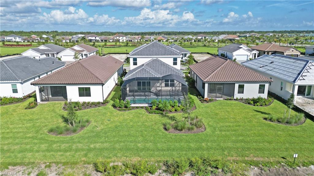 4652 Centaurus Circle Naples, FL 34120 - Photo 44 of 45 Aerial view of residential area