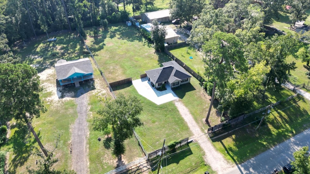 17855 Arbor Oaks Circle New Caney, TX 77357 - Photo 1 of 26 a view of a yard with plants