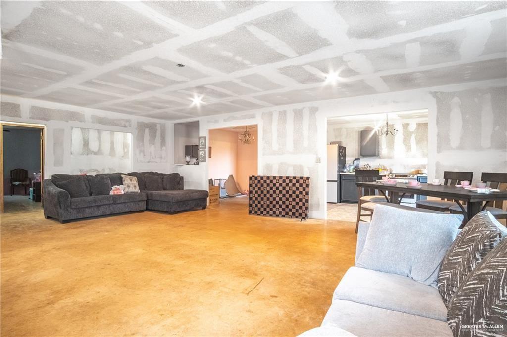 3905 Los Ebanos Road Mission, TX 78573 - Photo 4 of 20 a living room with furniture and a large window