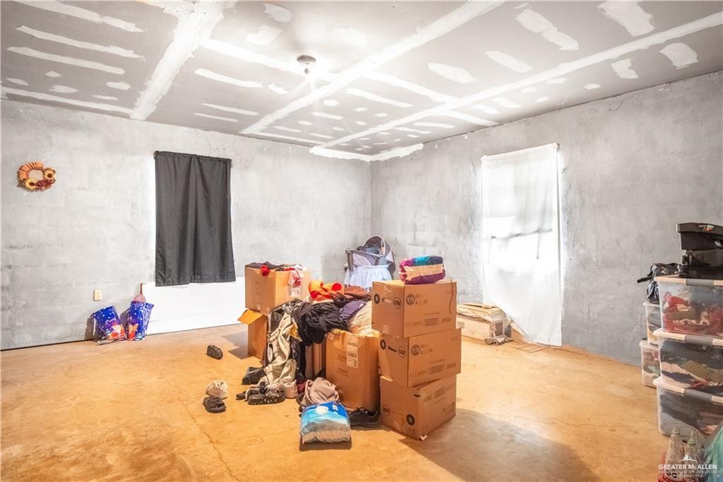 3905 Los Ebanos Road Mission, TX 78573 - Photo 7 of 20 a bed room with a bed and a window