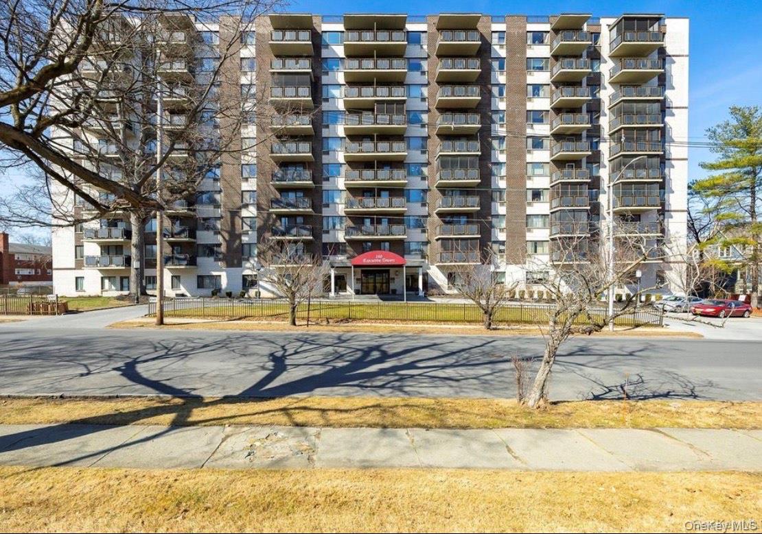a view of a swimming pool with a lounge chairs