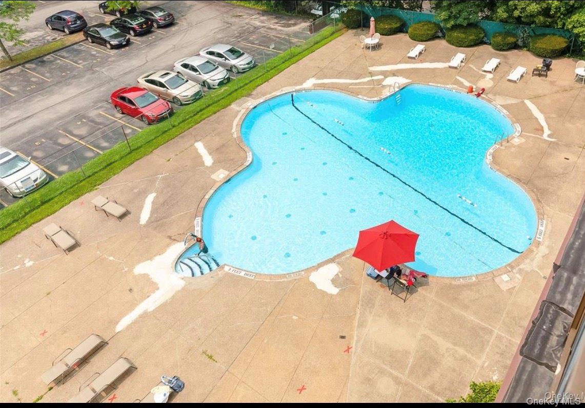 160 Academy Street, Unit L1 Poughkeepsie, NY 12601 - Photo 15 of 16 a view of a swimming pool with an outdoor space