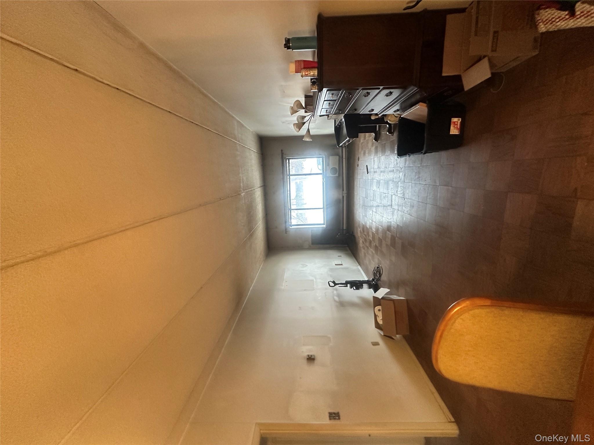 160 Academy Street, Unit L1 Poughkeepsie, NY 12601 - Photo 4 of 16 a living room with furniture and a gym equipment