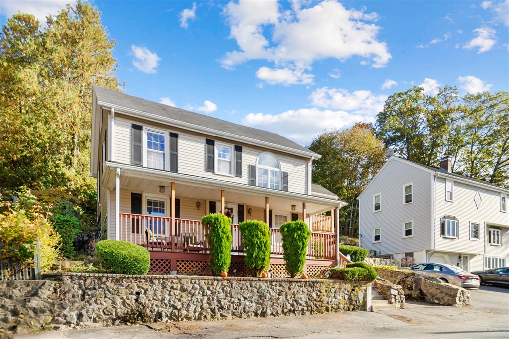 33 Springdale Avenue Saugus, MA 01906 - Photo 2 of 37 a front view of a house with garden
