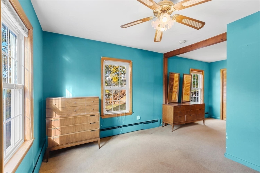 33 Springdale Avenue Saugus, MA 01906 - Photo 21 of 37 an empty room with windows and closet