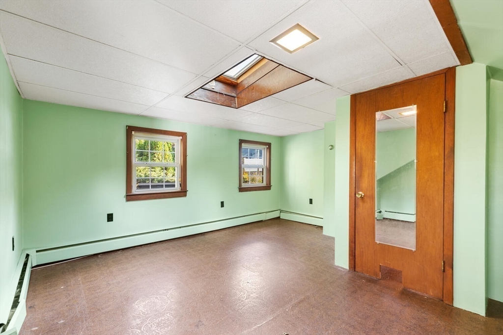 33 Springdale Avenue Saugus, MA 01906 - Photo 26 of 37 an empty room with windows and closet