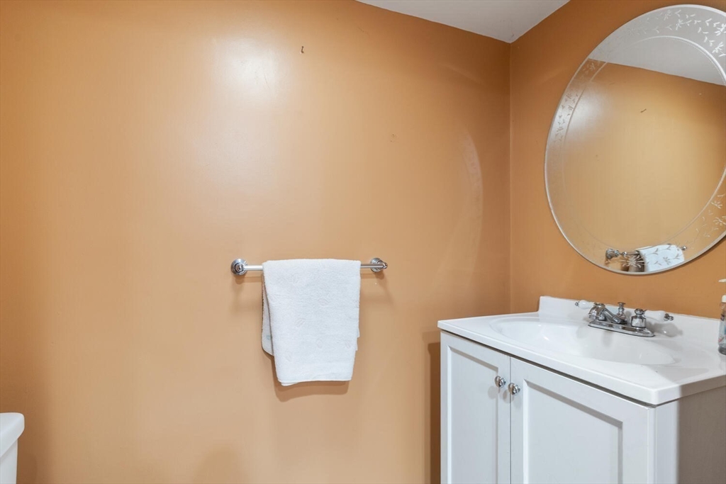 33 Springdale Avenue Saugus, MA 01906 - Photo 30 of 37 a bathroom with a sink and a mirror