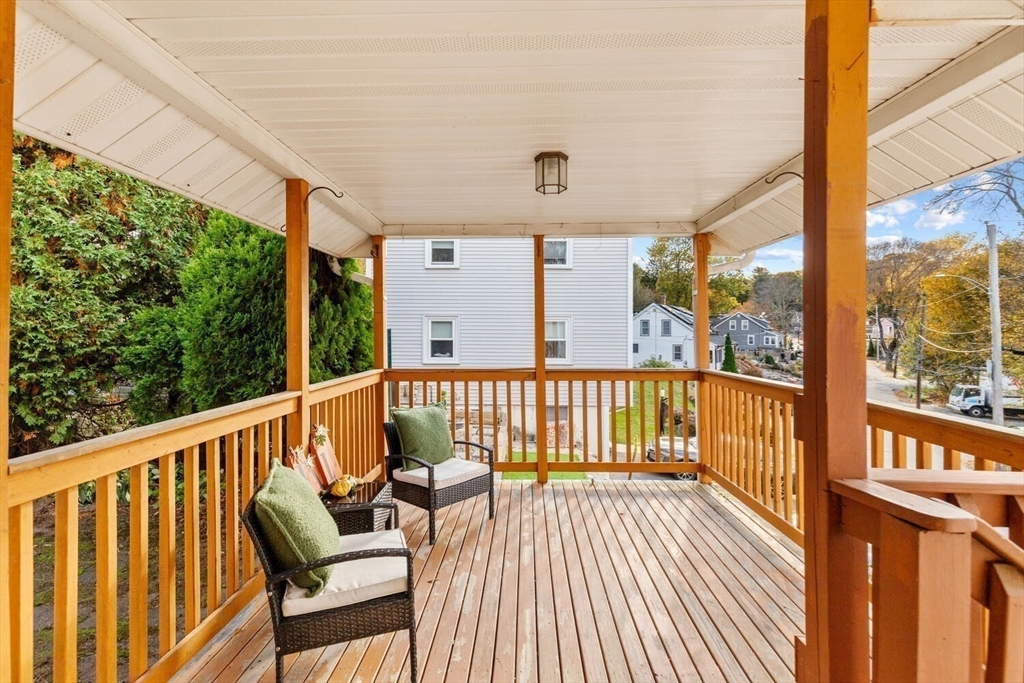 33 Springdale Avenue Saugus, MA 01906 - Photo 31 of 37 a view of balcony with wooden floor