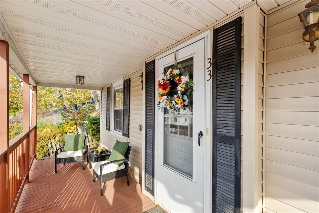 33 Springdale Avenue Saugus, MA 01906 - Photo 35 of 37 a very nice looking room with a large window and glass door