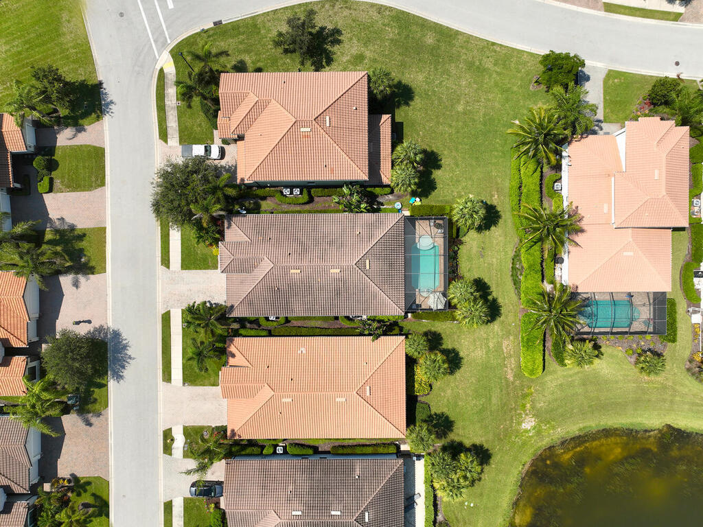 4613 Abaca Circle Naples, FL 34119 - Photo 33 of 36 an aerial view of a house with a yard