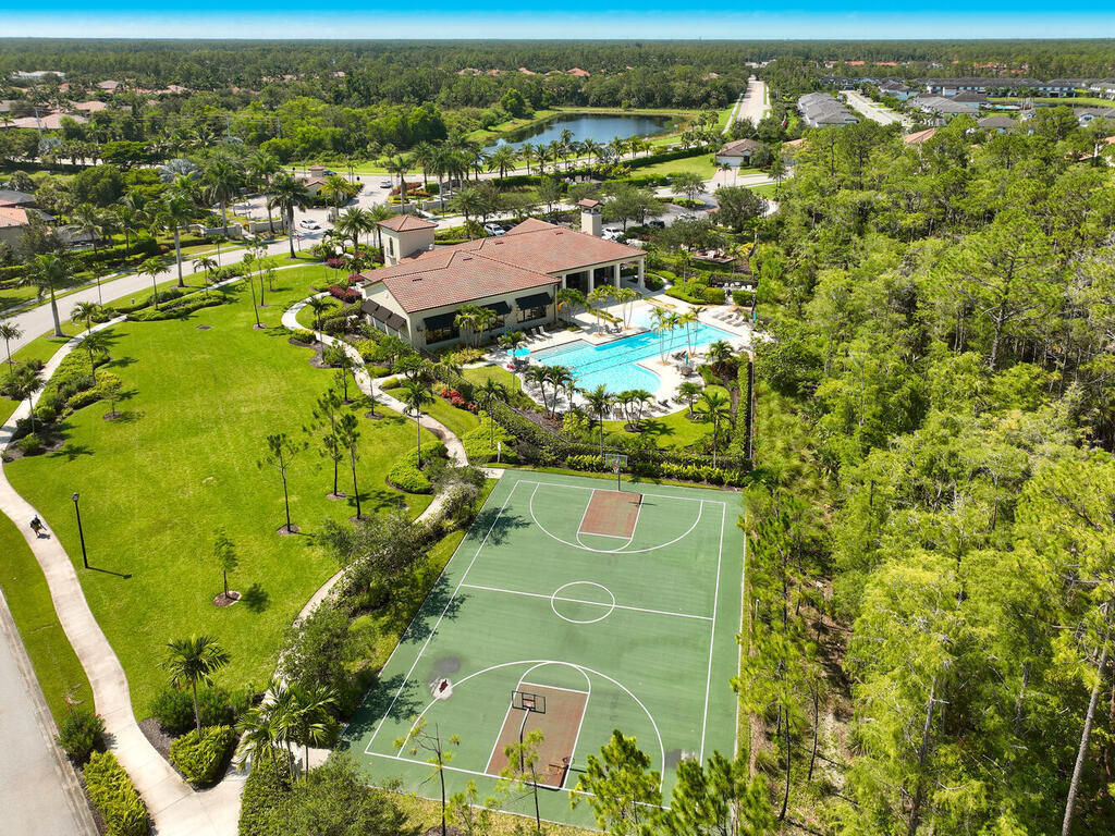 4613 Abaca Circle Naples, FL 34119 - Photo 34 of 36 an aerial view of residential houses with outdoor space