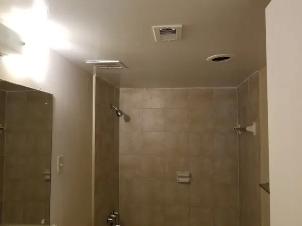 a front view of a house with parking