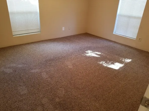 a view of a room that has a window in it