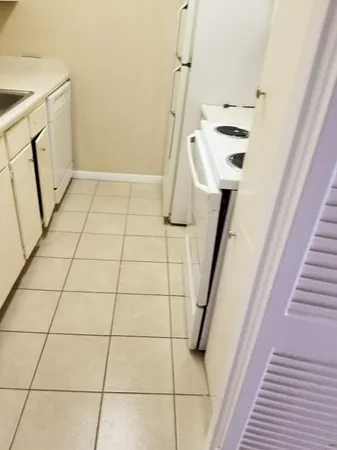 a bathroom with a sink and shower