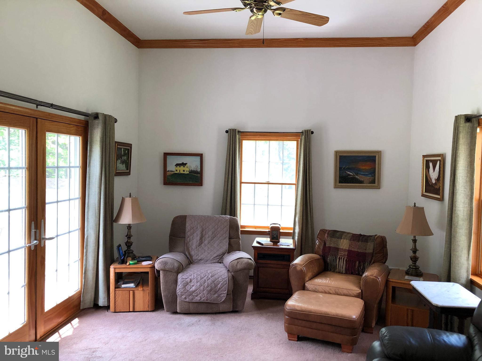 155 Newkirk Station Road Elmer, NJ 08318 - Photo 9 of 21 Den with Sliders to Deck