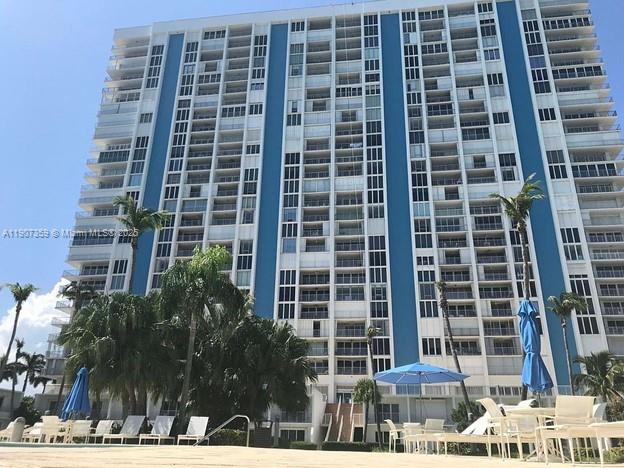 a view of a building with a street