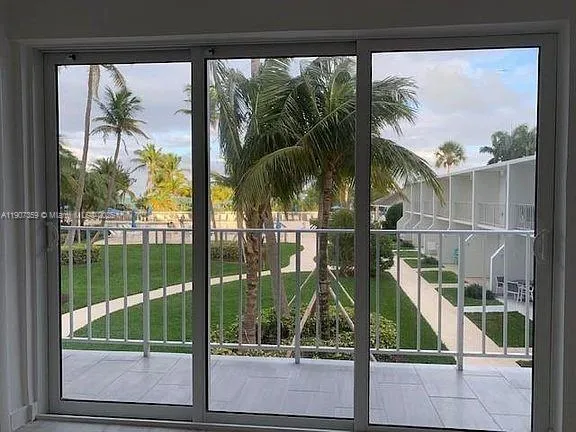 a view of swimming pool from a window
