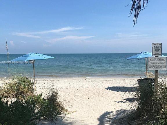 881 Ocean Drive, Unit TH11 Key Biscayne, FL 33149 - Photo 19 of 22 a view of a lake