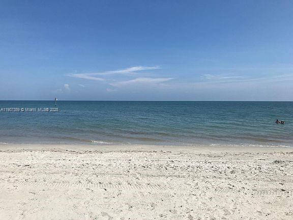881 Ocean Drive, Unit TH11 Key Biscayne, FL 33149 - Photo 20 of 22 a view of a beach