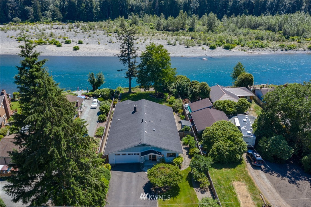 1118 Dyer Road Sultan, WA 98294 - Photo 1 of 40 an aerial view of a house with a yard and lake view