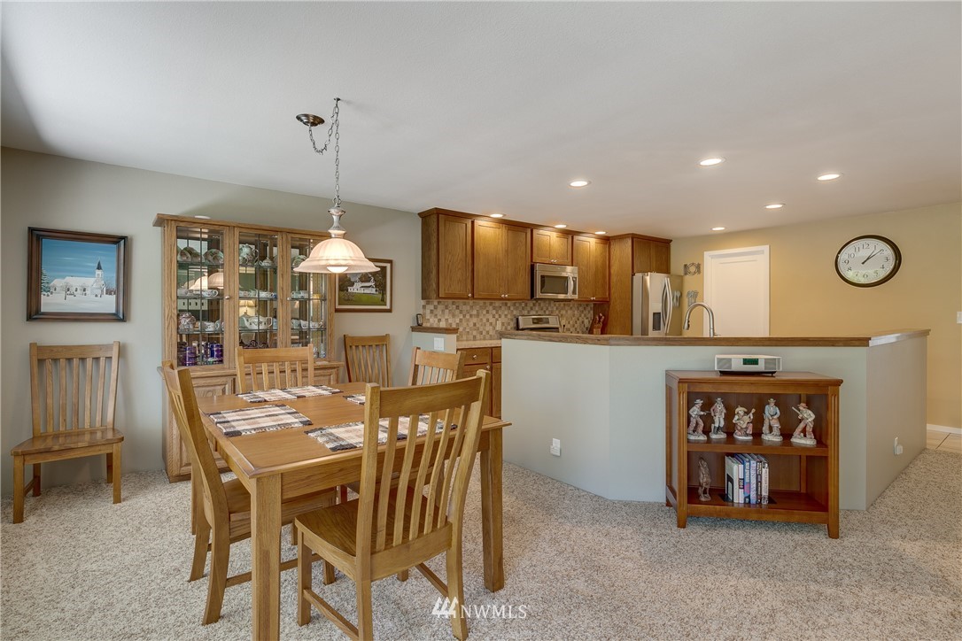1118 Dyer Road Sultan, WA 98294 - Photo 11 of 40 a view of a dining room with furniture