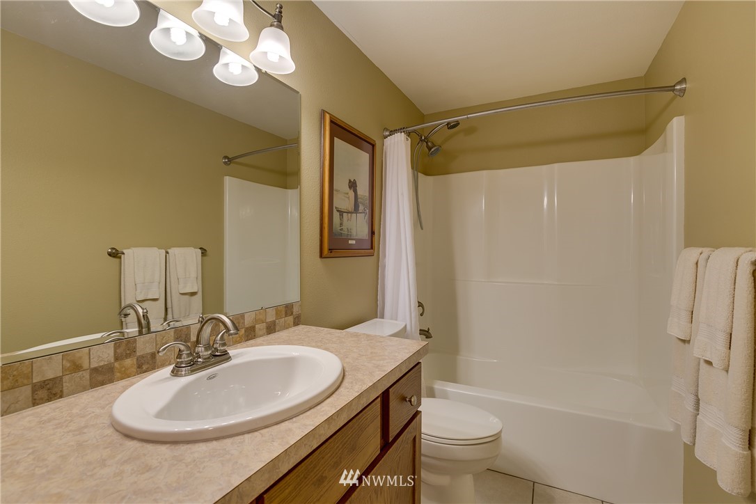 1118 Dyer Road Sultan, WA 98294 - Photo 18 of 40 a bathroom with a sink toilet and shower
