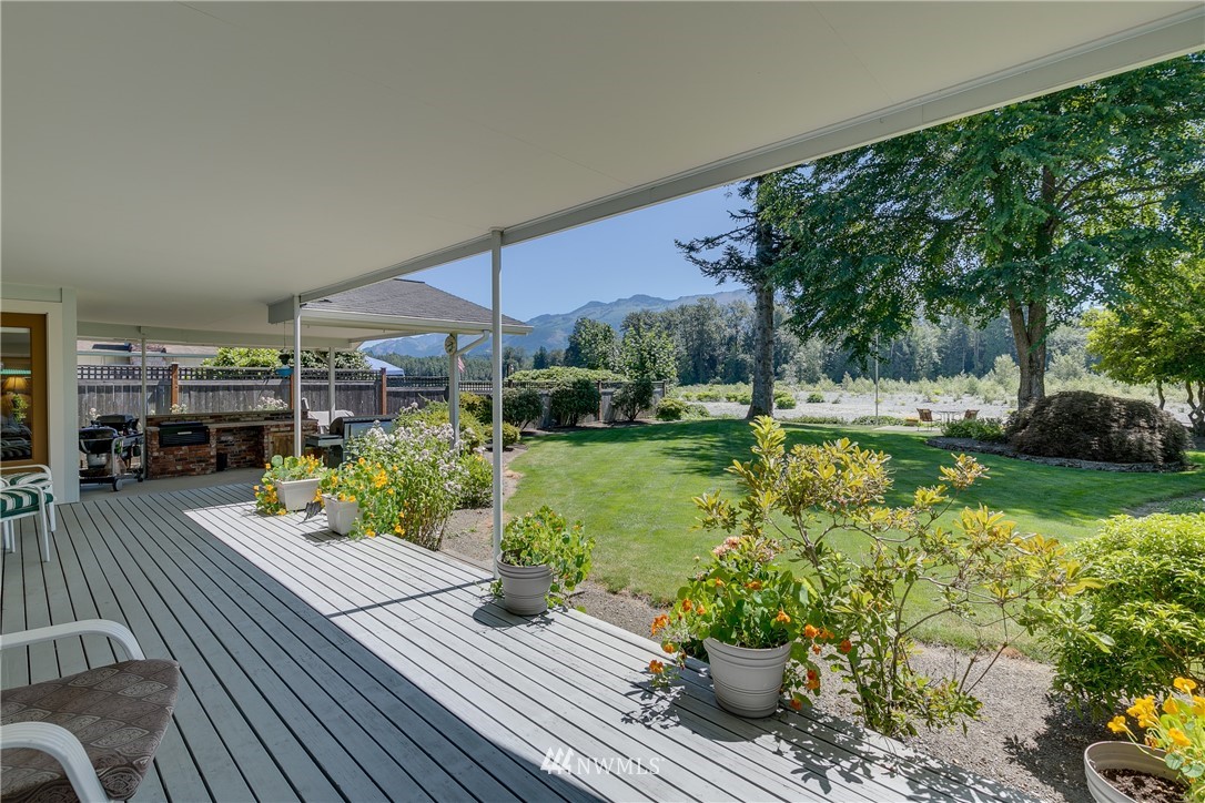 1118 Dyer Road Sultan, WA 98294 - Photo 24 of 40 a view of a house with a garden