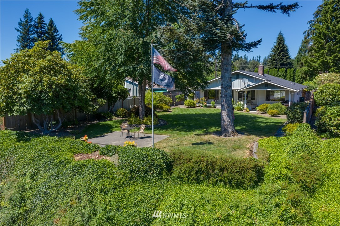 1118 Dyer Road Sultan, WA 98294 - Photo 38 of 40 a view of a house with backyard and garden