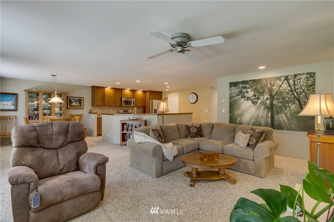 1118 Dyer Road Sultan, WA 98294 - Photo 9 of 40 a living room with furniture and a view of kitchen