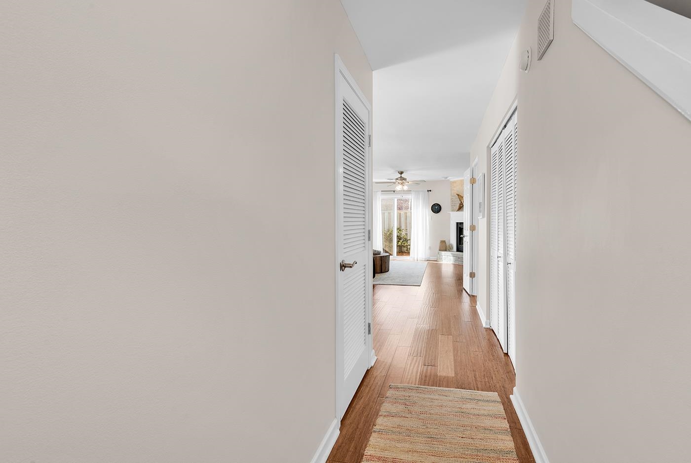 830 44th Avenue North, Unit L1 Myrtle Beach, SC 29577 - Photo 18 of 40 Hallway featuring baseboards and wood finished floors