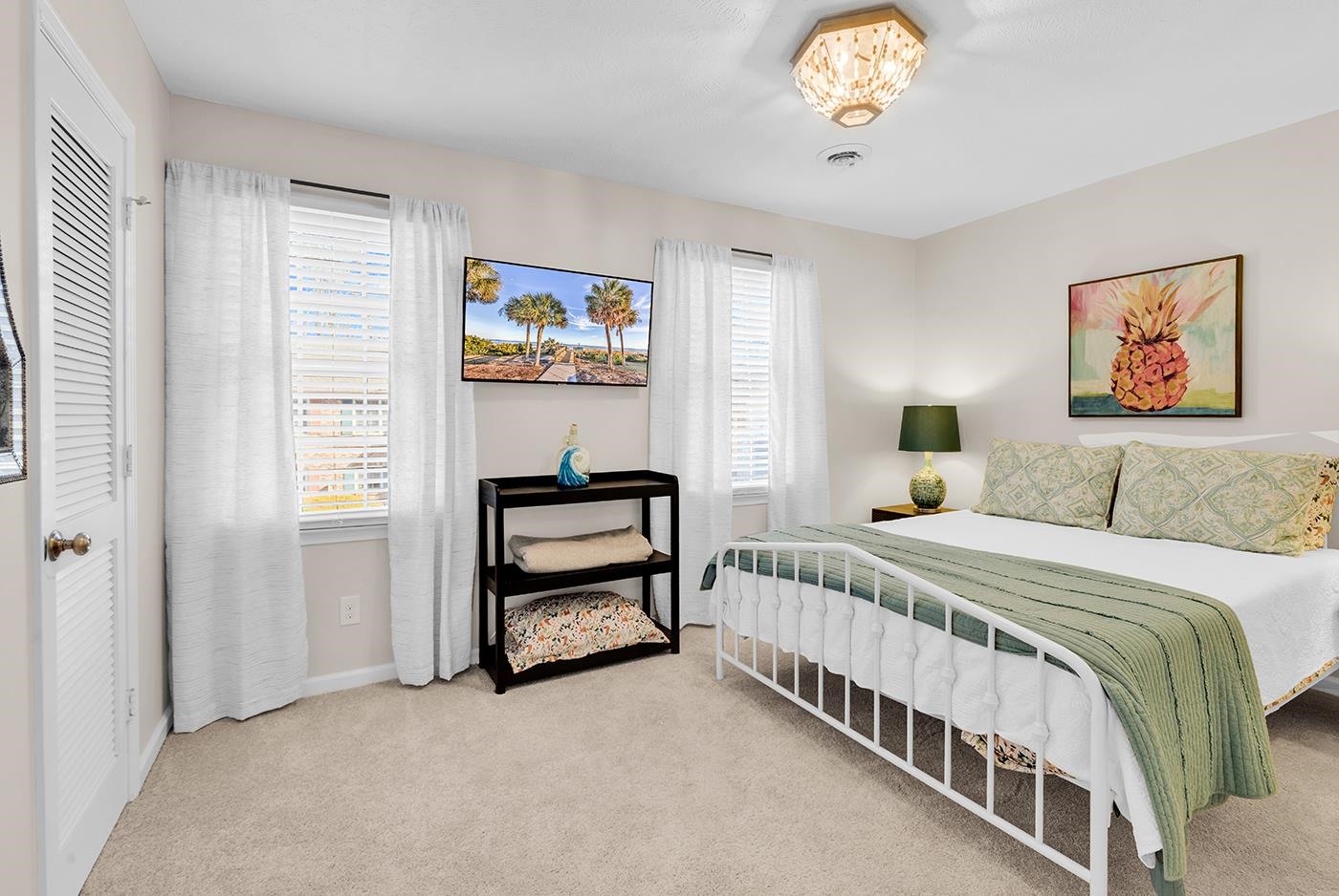830 44th Avenue North, Unit L1 Myrtle Beach, SC 29577 - Photo 22 of 40 Bedroom featuring light colored carpet and multiple windows