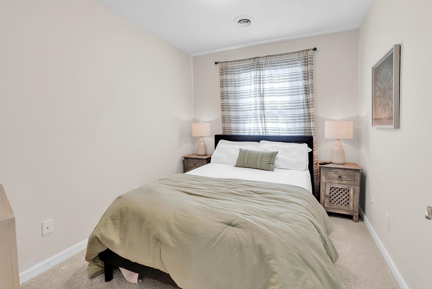 830 44th Avenue North, Unit L1 Myrtle Beach, SC 29577 - Photo 24 of 40 Bedroom with light colored carpet and baseboards