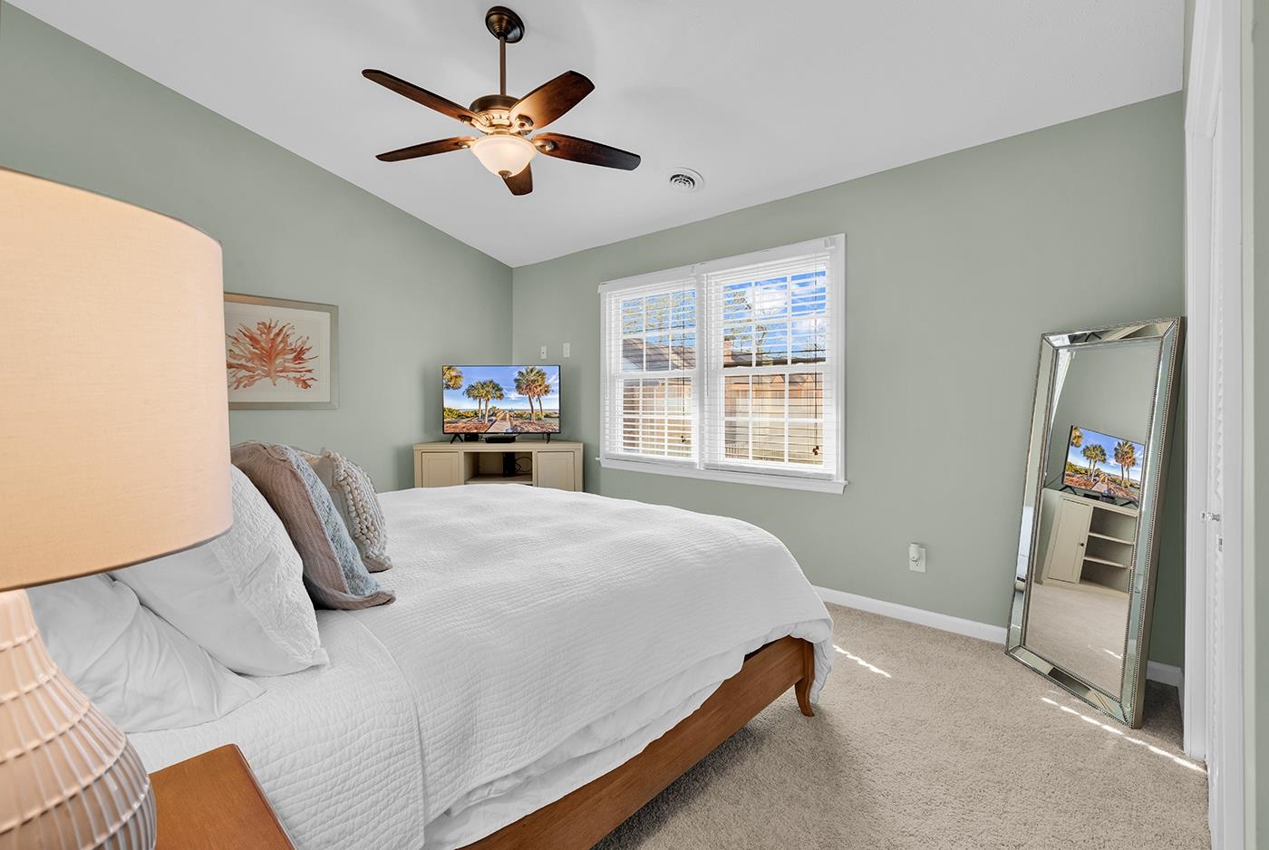 830 44th Avenue North, Unit L1 Myrtle Beach, SC 29577 - Photo 26 of 40 Carpeted bedroom with lofted ceiling and a ceiling fan