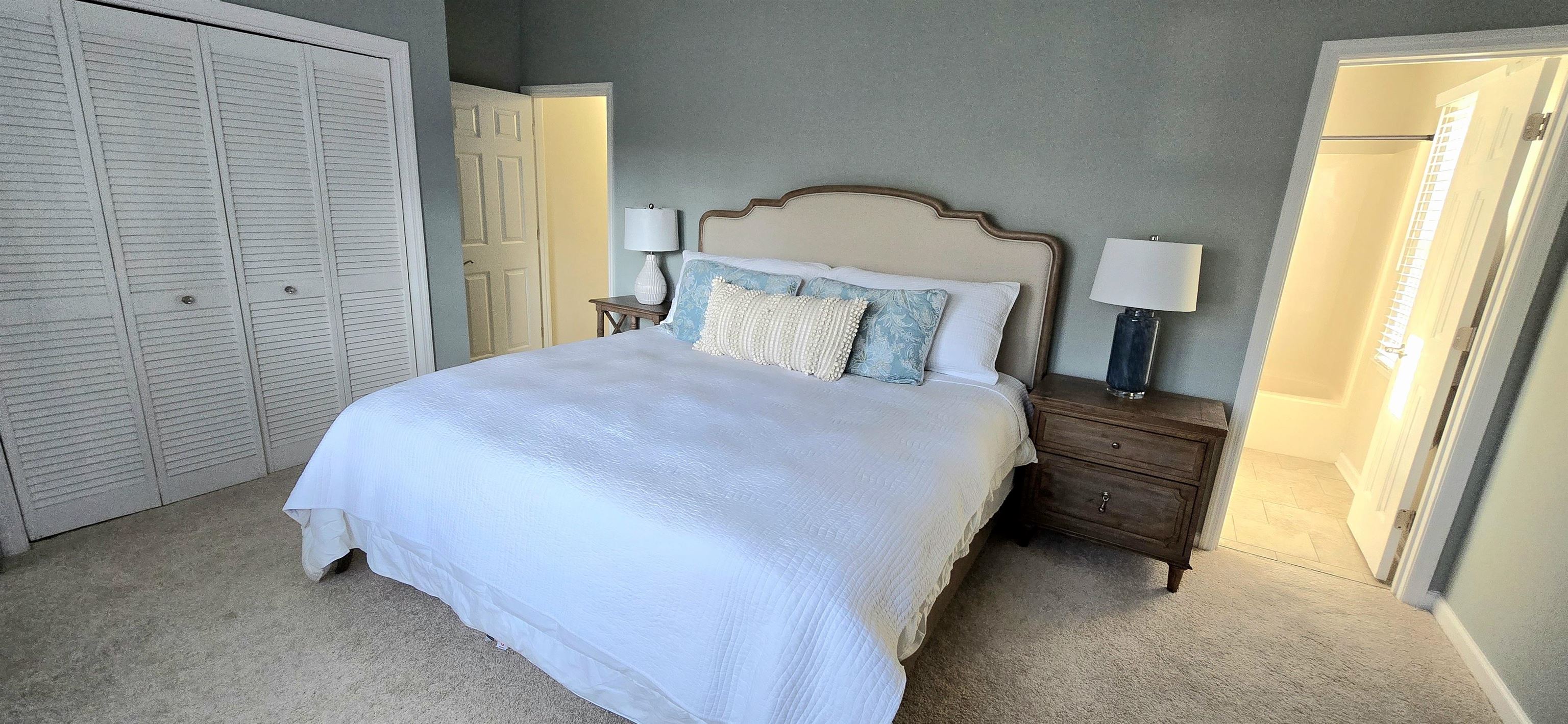 830 44th Avenue North, Unit L1 Myrtle Beach, SC 29577 - Photo 29 of 40 Bedroom with a closet and carpet floors