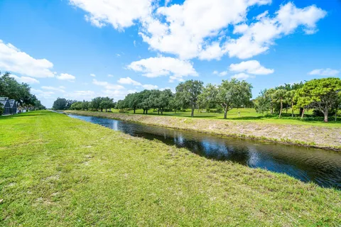 a view of a lake with a big yard