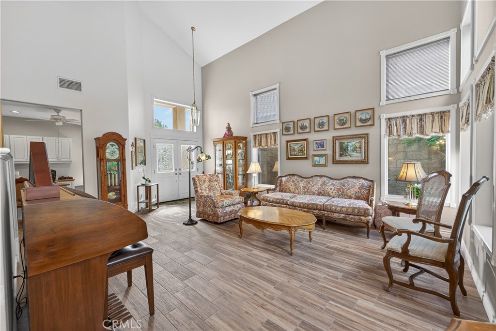 17 Vía Anadeja Rancho Santa Margarita, CA 92688 - Photo 16 of 43 a living room with furniture and wooden floor