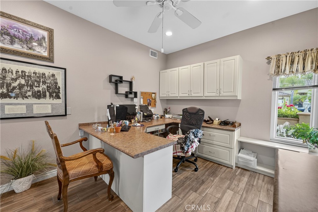 17 Vía Anadeja Rancho Santa Margarita, CA 92688 - Photo 22 of 43 a view of a workspace with furniture and wooden floor