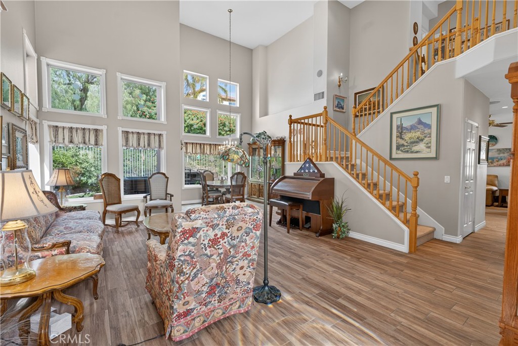 17 Vía Anadeja Rancho Santa Margarita, CA 92688 - Photo 8 of 43 a living room with furniture and floor to ceiling windows