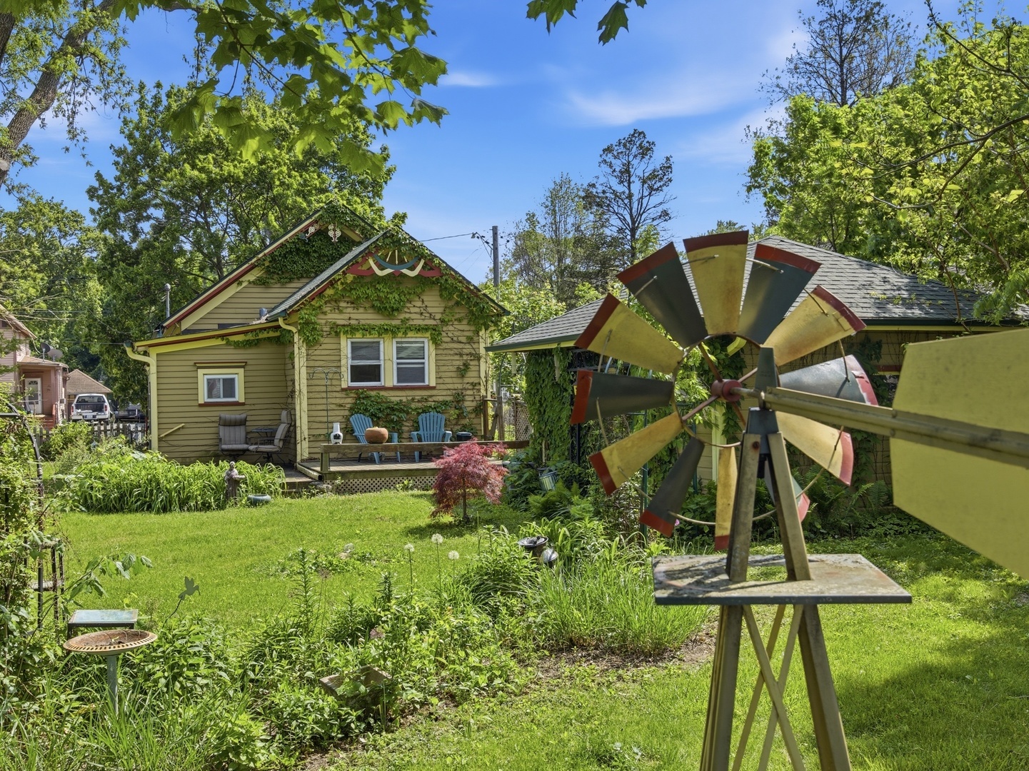 570 Addison Street Elgin, IL 60120 - Photo 8 of 17 a front view of house with a garden