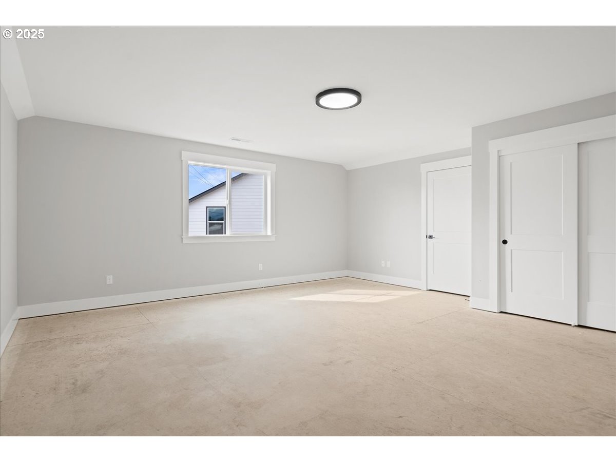 628 Parker Loop Silverton, OR 97381 - Photo 14 of 19 a view of an empty room with a window