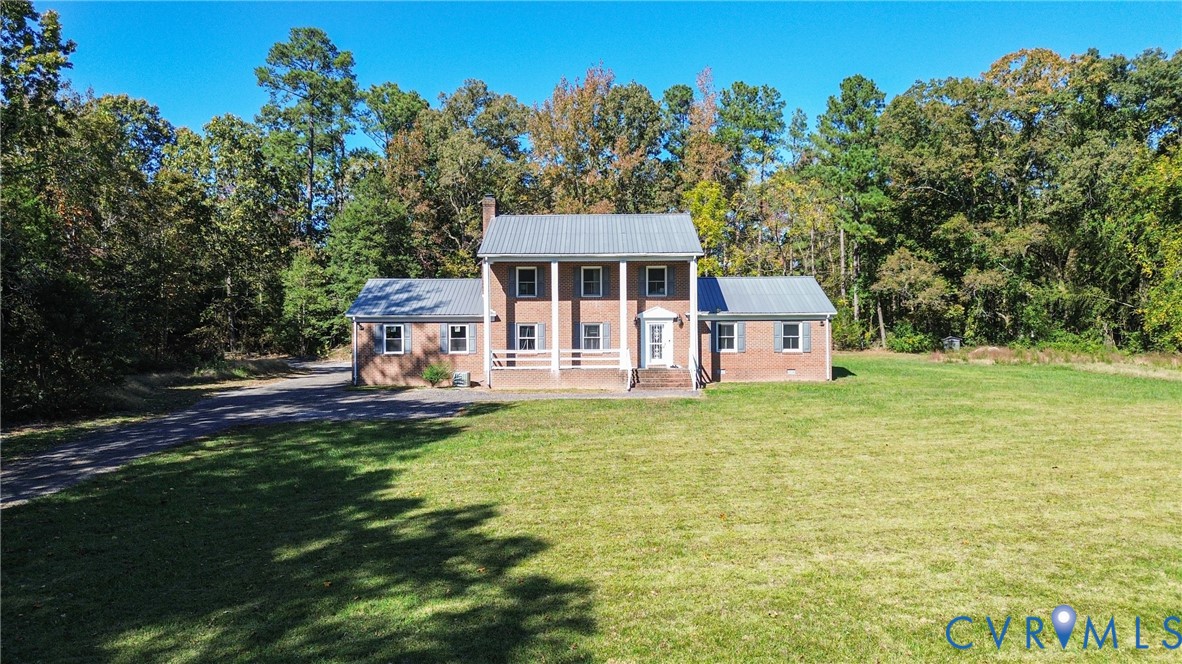 13225 Old Happy Hill Road Chester, VA 23831 - Photo 12 of 24 a view of a house with pool and a yard